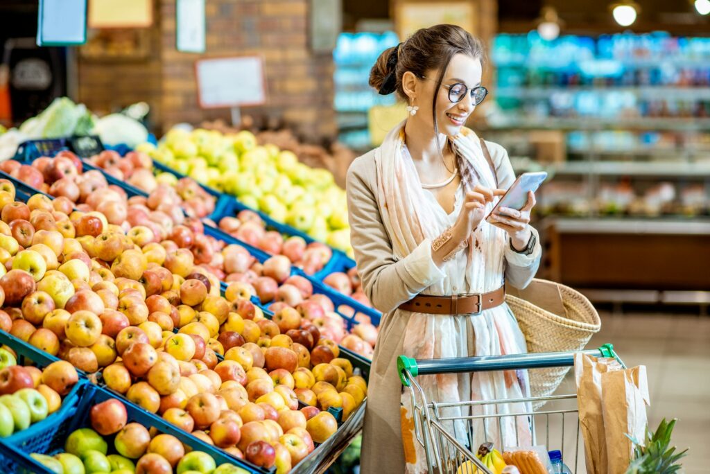 Woman buying food in the supermarket